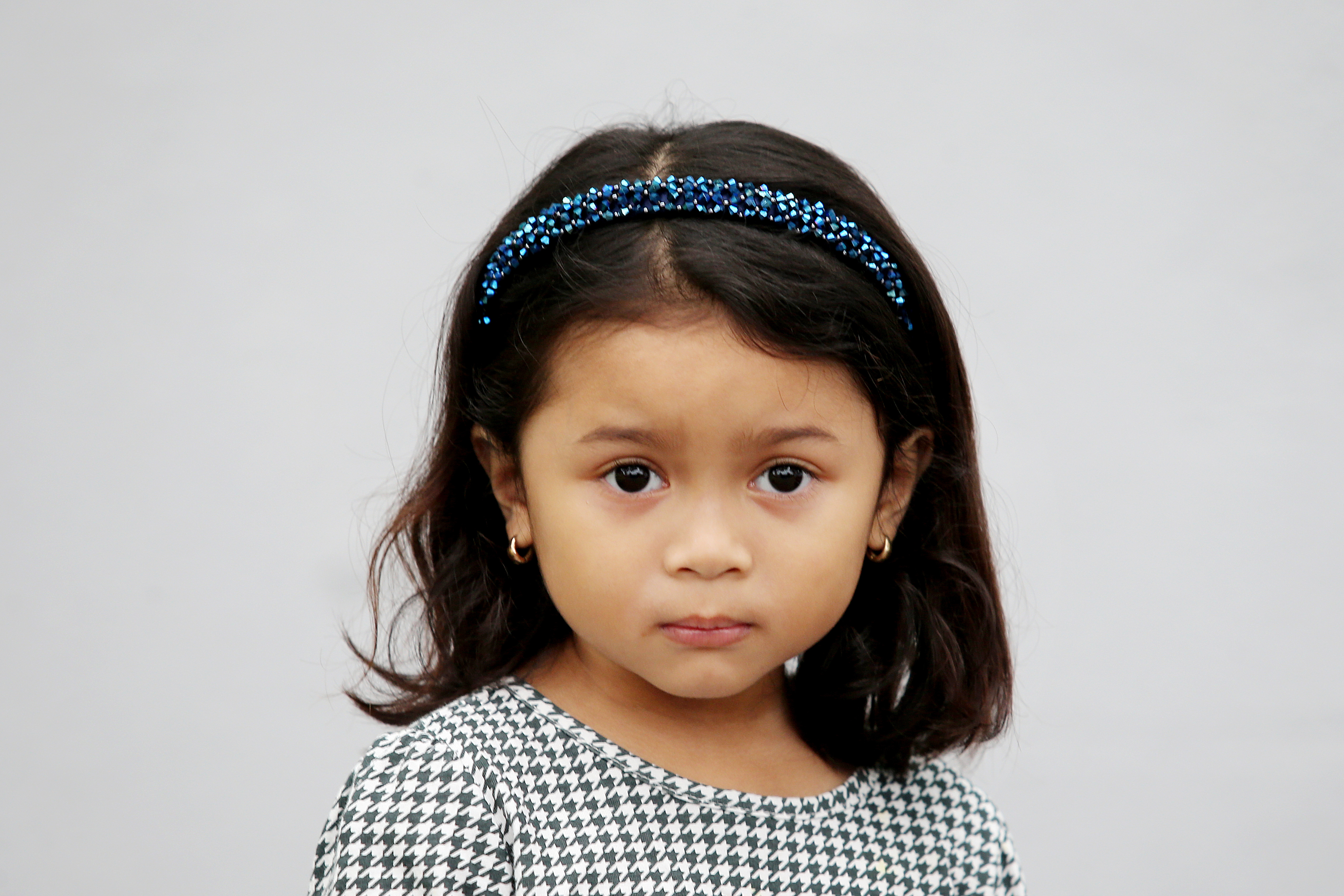 Image of young girl with dark brown hair
