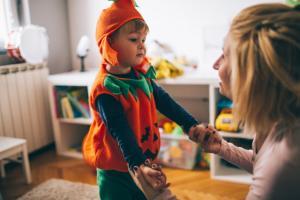 a kid in a halloween costume